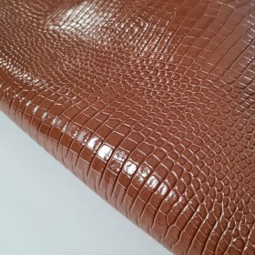 vacuno grabado cocodrilo