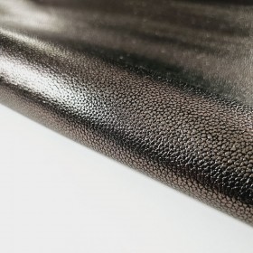 Steel metal finish over black leatherside