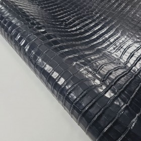 Dark blue crocodile embossed leather side
