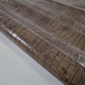 cuero grabado cocodrilo marron
