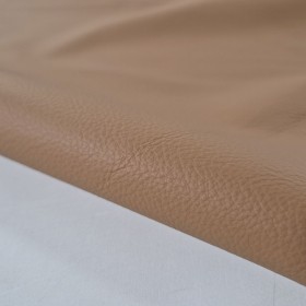 Medium brown dyed milled cowleather hides