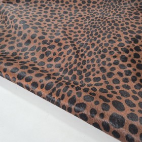 piel vacuno pelo marrón estampado leopardo animal print manchas negro