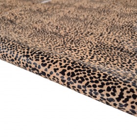 Hair animal print stamped over cowleather side